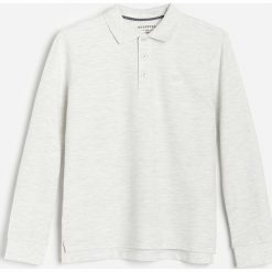 Melanżowa koszulka polo -. Koszulki męskie Reserved, bez wzorów, bez rękawów. Za 29,99 zł.