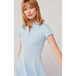 Sukienka Polo błękitna– trapezowa XXS niebieski. Niebieskie sukienki damskie s, z bawełny, sportowe, polo, krótkie, mini, sportowe. Za 347,00 zł.