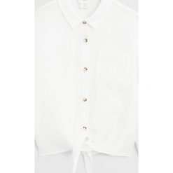 Mango Kids - Koszula dziecięca Lazo 122-164 cm. Białe bluzki dziewczęce Mango Kids, bez wzorów, z lyocellu, z klasycznym kołnierzykiem, z długim rękawem, długie, bez kaptura. W wyprzedaży za 71,90 zł.