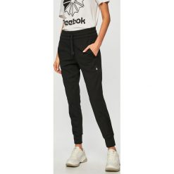 Reebok - Spodnie sportowe. Spodnie damskie Reebok. Za 229,90 zł.