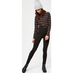 Spodnie typu legins. Czarne spodnie damskie Moodo, xl. Za 39,99 zł.