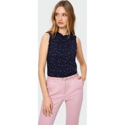 Elegancka bluzka bez rękawów. Bluzki damskie Greenpoint, bez wzorów, z wiskozy, eleganckie, bez kołnierzyka, bez rękawów. Za 79,99 zł.