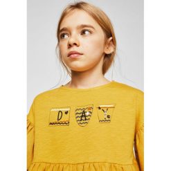 Mango Kids - Top dziecięcy Day 110-164 cm. Pomarańczowe bluzki dziewczęce marki Mango Kids, z nadrukiem, z bawełny, z okrągłym kołnierzem. W wyprzedaży za 39,90 zł.