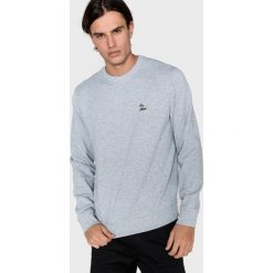 Lacoste Bluza Szary. Szare bluzy męskie Lacoste, xl, bez wzorów, z elastanu, bez kołnierzyka, bez rękawów, bez kaptura. Za 533,95 zł.