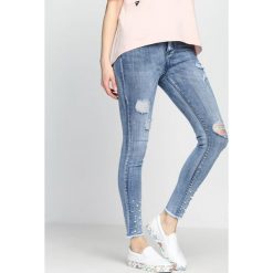 Jeansy damskie: Niebieskie Jeansy Trek