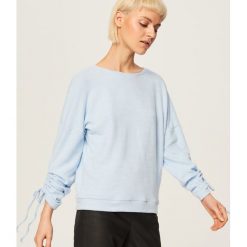Sweter z wiązanymi rękawami - Niebieski. Niebieskie bez kategorii Reserved, s. W wyprzedaży za 29,99 zł.