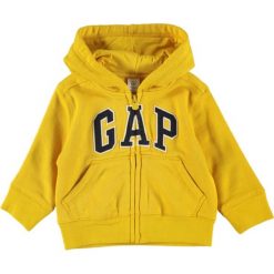 Bluza w kolorze żółtym. Żółte bluzy niemowlęce Gap Kids, z aplikacjami, bez rękawów, bez kaptura. W wyprzedaży za 65,95 zł.