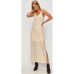 Vero Moda - Sukienka. Białe sukienki damskie Vero Moda, na co dzień, s, w koronkowe wzory, z poliesteru, casualowe, z okrągłym kołnierzem, bez rękawów, midi, rozkloszowane. Za 219,90 zł.