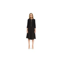 Kurtki lekkie Style S038 Krótki żakiet z zameczkami na podszewce. Czarne kurtki damskie Style, s, bez wzorów, krótkie, bez kaptura. Za 135,00 zł.
