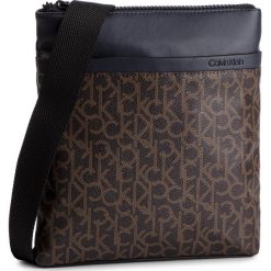 Saszetka CALVIN KLEIN - Ck Mono Flat Crossover K50K504348 908. Pomarańczowe torby męskie skórzane Calvin Klein, bez wzorów, ze skóry ekologicznej, młodzieżowe. W wyprzedaży za 259,00 zł.