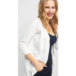 Sweter w groszki 3D. Różowe kardigany damskie Orsay, s, w grochy, z bawełny. Za 49,99 zł.