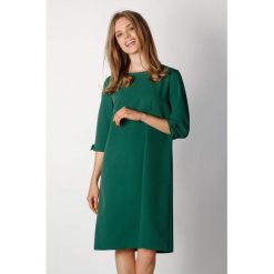 Sukienka w kolorze zielonym. Zielone sukienki damskie Moda na kolor, xs, bez wzorów, bez kołnierzyka, bez rękawów, midi. W wyprzedaży za 109,95 zł.