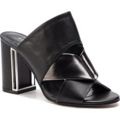 Klapki BRUNO PREMI - Nappa Metal BW2404N Nero/Antracite. Czarne klapki damskie Bruno Premi, bez wzorów, ze skóry, bez obcasa, na obcasie. W wyprzedaży za 349,00 zł.