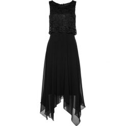 Sukienka Premium bonprix czarny. Czarne sukienki damskie bonprix, w koronkowe wzory, z koronki, eleganckie, bez kołnierzyka, bez rękawów, rozkloszowane. Za 169,99 zł.