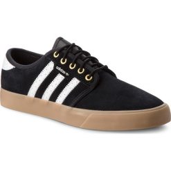 Buty adidas - Seeley B27789 Cblack/Ftwwht/Goldmt. Czarne buty sportowe damskie marki Adidas, bez wzorów, ze skóry, sportowe. W wyprzedaży za 209,00 zł.