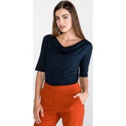 Tom Tailor Koszulka Niebieski. Niebieskie koszulki damskie Tom Tailor, xs, bez wzorów, z elastanu, bez kołnierzyka, z krótkim rękawem. Za 102,95 zł.