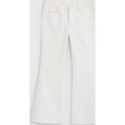 Mango Kids - Jeansy dziecięce Flare 110-164 cm. Różowe jeansy dziewczęce Mango Kids, bez wzorów, z elastanu. W wyprzedaży za 71,90 zł.