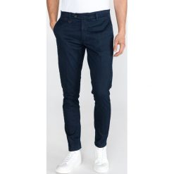 Antony Morato Bryan Spodnie Niebieski. Niebieskie spodnie męskie Antony Morato, bez wzorów, z elastanu. Za 395,95 zł.