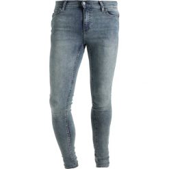 Cheap Monday HIM SPRAY Jeans Skinny Fit daze blue. Niebieskie jeansy męskie relaxed fit marki Cheap Monday. W wyprzedaży za 167,20 zł.