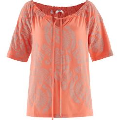 Tunika shirtowa, krótki rękaw bonprix łososiowy z nadrukiem. Pomarańczowe tuniki damskie marki bonprix, z nadrukiem, bez kołnierzyka, z krótkim rękawem. Za 49,99 zł.