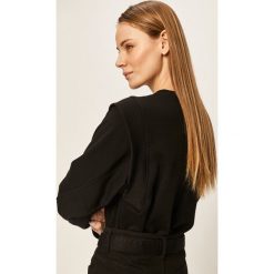 Answear - Bluza. Czarne bluzy damskie ANSWEAR, s, bez wzorów, z elastanu, bez rękawów, bez kaptura. W wyprzedaży za 69,90 zł.