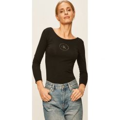 Calvin Klein Jeans - Bluzka. Białe bluzki damskie Calvin Klein Jeans, s, z nadrukiem, z elastanu, z okrągłym kołnierzem, bez rękawów. W wyprzedaży za 159,90 zł.