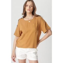 Camelowa Bluzka Metiolato. Brązowe bluzki damskie Born2be, s, bez wzorów, bez kołnierzyka, bez rękawów. W wyprzedaży za 69,99 zł.