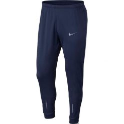 Spodnie do biegania męskie NIKE THERMA ESSENTIAL PANT / 858138-429. Spodnie męskie Nike, m, bez wzorów. Za 179,99 zł.