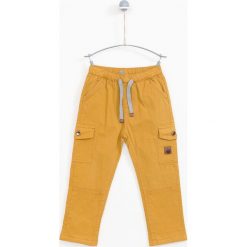 Lemon Explore - Spodnie dziecięce 86-116 cm. Zielone spodnie chłopięce marki LEMON explore, bez wzorów, z elastanu, casualowe. W wyprzedaży za 59,90 zł.