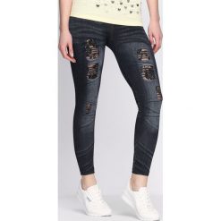 Granatowe Legginsy Spirit. Niebieskie legginsy damskie marki Born2be, s. Za 34,99 zł.