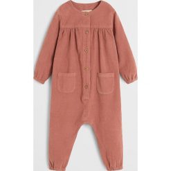 Mango Kids - Kombinezon dziecięcy Iris 80-104 cm. Różowe kombinezony dziewczęce Mango Kids, bez wzorów, z bawełny, z długim rękawem, długie. W wyprzedaży za 49,90 zł.