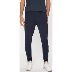 Ellesse - Spodnie. Niebieskie spodnie męskie Ellesse, xxl, bez wzorów, z elastanu. W wyprzedaży za 129,90 zł.