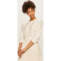 Tommy Hilfiger - Bluzka. Białe bluzki damskie TOMMY HILFIGER, bez wzorów, z bawełny, eleganckie, z okrągłym kołnierzem, bez rękawów. W wyprzedaży za 219,90 zł.