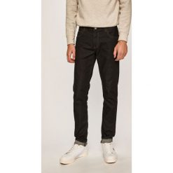 Armani Exchange - Jeansy J14. Niebieskie jeansy męskie Armani Exchange, bez wzorów. Za 419,90 zł.