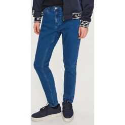 Jeansy męskie: Klasyczne jeansy slim fit – Granatowy