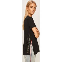 Diesel - T-shirt. Czarne bluzki damskie Diesel, s, z nadrukiem, z bawełny, casualowe, z okrągłym kołnierzem. Za 259,90 zł.