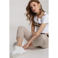 Biały T-shirt Noel. Białe t-shirty damskie Renee, s, bez wzorów, bez kołnierzyka. Za 69,99 zł.
