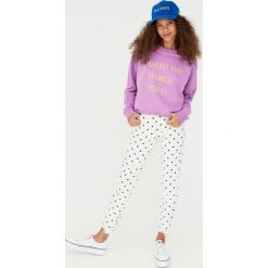 Spodnie damskie: Wzorzyste jeansy skinny fit