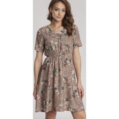 Jasnobeżowa Sukienka Mairila. Brązowe sukienki damskie Renee, s, bez wzorów, bez kołnierzyka, bez rękawów, mini. Za 79,99 zł.