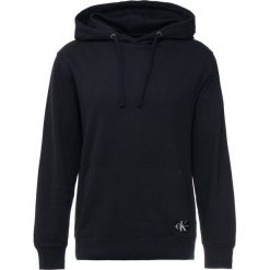 Calvin Klein Jeans MONOGRAM LOGO BADGE HOODIE Bluza z kapturem blue. Niebieskie bluzy męskie rozpinane Calvin Klein Jeans, m, z bawełny, z kapturem. Za 459,00 zł.