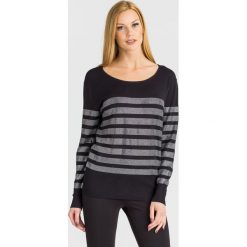 SWETER ANNA GUESS. Czarne swetry damskie Guess, s, z aplikacjami, z dzianiny, bez rękawów, bez kaptura. Za 549,00 zł.