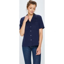 Calvin Klein Jeans - Koszula. Niebieskie bluzki damskie Calvin Klein Jeans, s, bez wzorów, z bawełny, casualowe, bez kołnierzyka, z krótkim rękawem. W wyprzedaży za 299,90 zł.