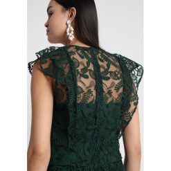 IVY & OAK BRIDAL Bluzka eden green. Zielone bluzki damskie marki IVY & OAK, bez wzorów, z bawełny, bez kołnierzyka, bez rękawów. Za 379,00 zł.