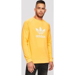Adidas Originals - Bluza. Pomarańczowe bluzy męskie adidas Originals, m, z nadrukiem, z poliesteru, z okrągłym kołnierzem, bez rękawów, bez kaptura. Za 199,90 zł.