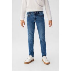 Mango Kids - Jeansy dziecięce Slim 110-164 cm. Niebieskie spodnie chłopięce Mango Kids, bez wzorów, z elastanu. Za 69,90 zł.