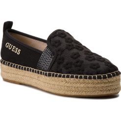 Espadryle GUESS - Rela FLRLE2 FAB14 BLACK. Czarne espadryle damskie Guess, z aplikacjami, z materiału, na płaskiej podeszwie. W wyprzedaży za 239,00 zł.
