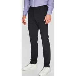 Joop! - Spodnie. Niebieskie spodnie męskie JOOP!, z haftami, z elastanu, eleganckie. W wyprzedaży za 459,90 zł.