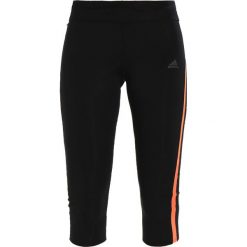Spodnie dresowe damskie: adidas Performance Rybaczki sportowe black/hire orange