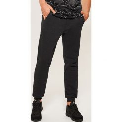 Dresowe joggery - Czarny. Czarne spodnie męskie House, s, bez wzorów, z dresówki. Za 79,99 zł.