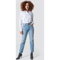 Levi's Jeansy 501 Crop - Blue. Niebieskie spodnie z wysokim stanem Levi's®, z jeansu. Za 404,95 zł.